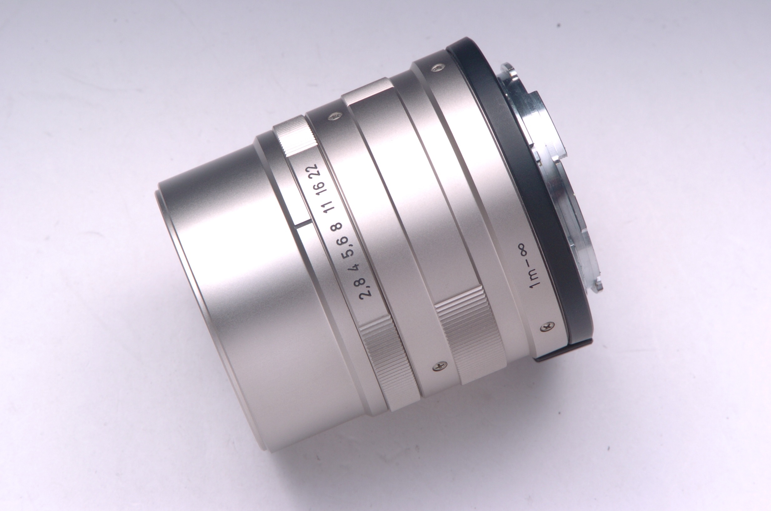 Sonnar T* 90mm F2.8 (G用) + 46mm Pフィルター + メタルフード GG-3 + メタルキャップ GK-57