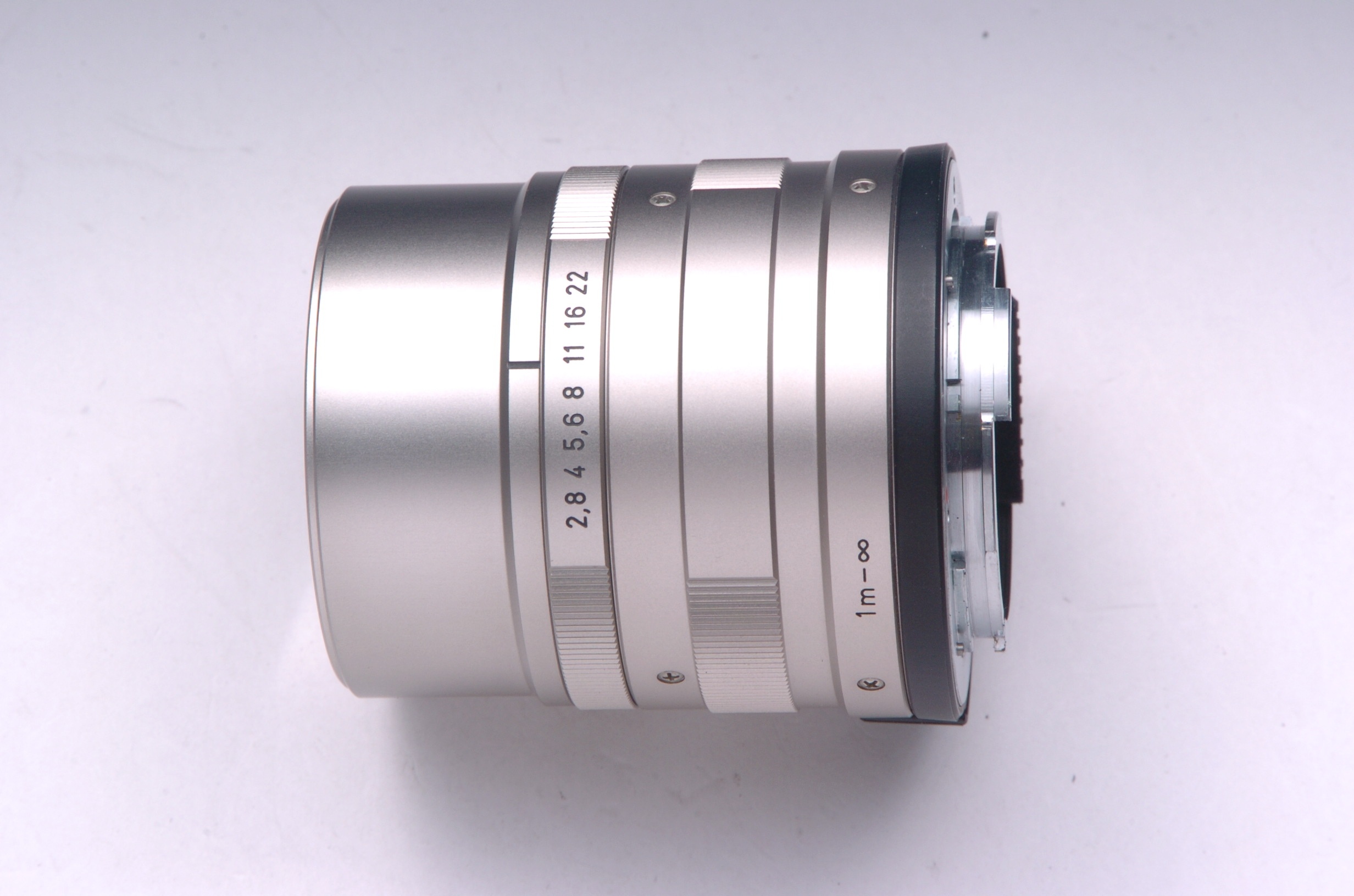 Sonnar T* 90mm F2.8 (G用) + 46mm Pフィルター + メタルフード GG-3 + メタルキャップ GK-57