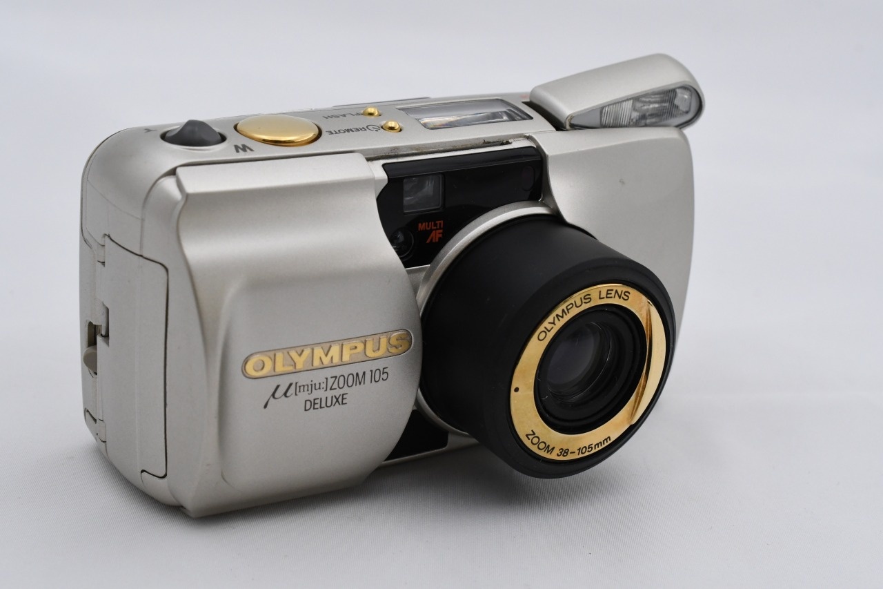 μ [mju:] ZOOM 105 DELUXE 