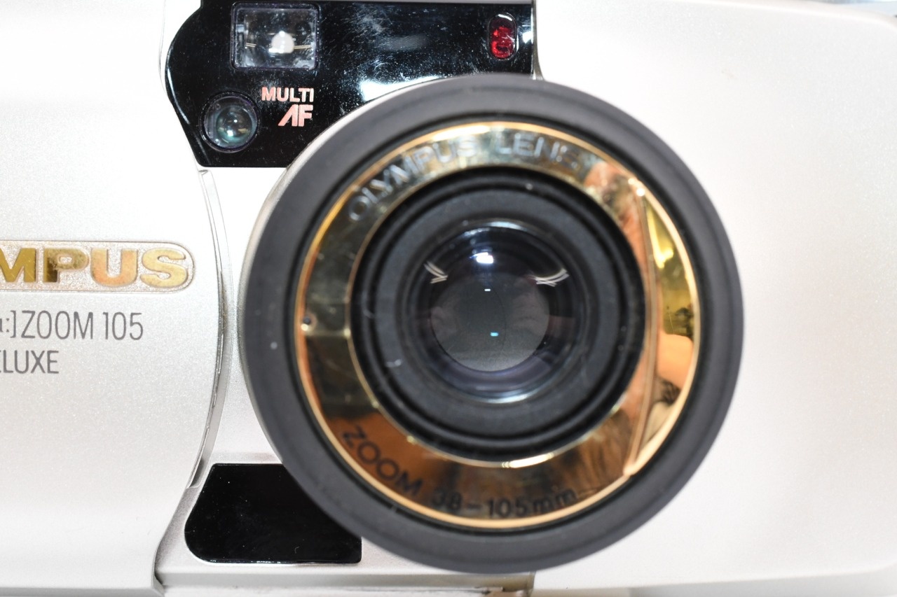 μ [mju:] ZOOM 105 DELUXE 