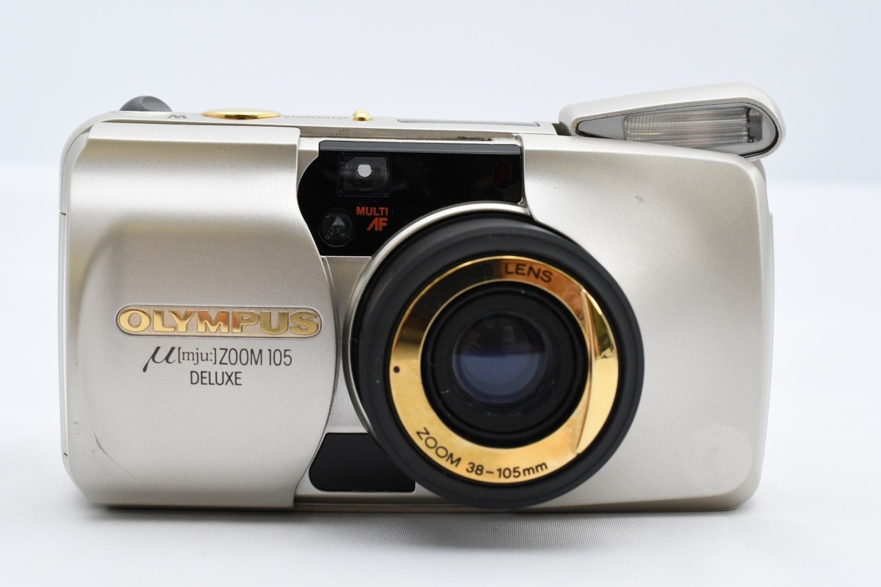 μ [mju:] ZOOM 105 DELUXE 