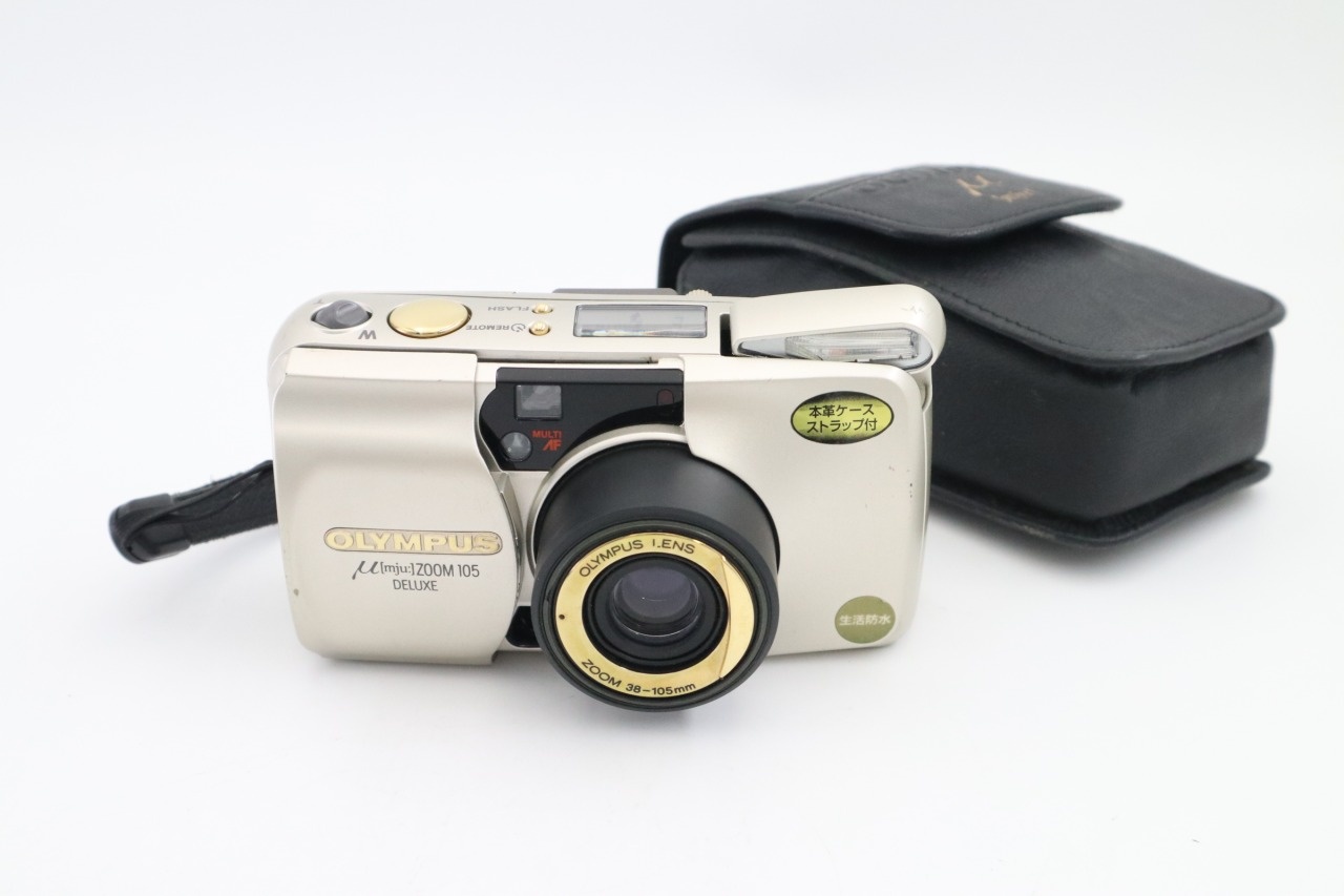 μ [mju:] ZOOM 105 DELUXE 