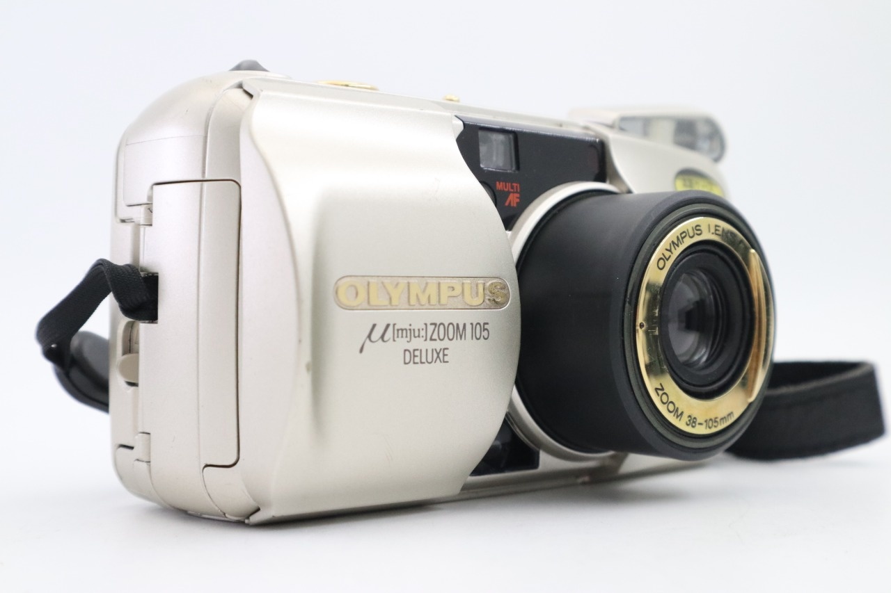 μ [mju:] ZOOM 105 DELUXE 