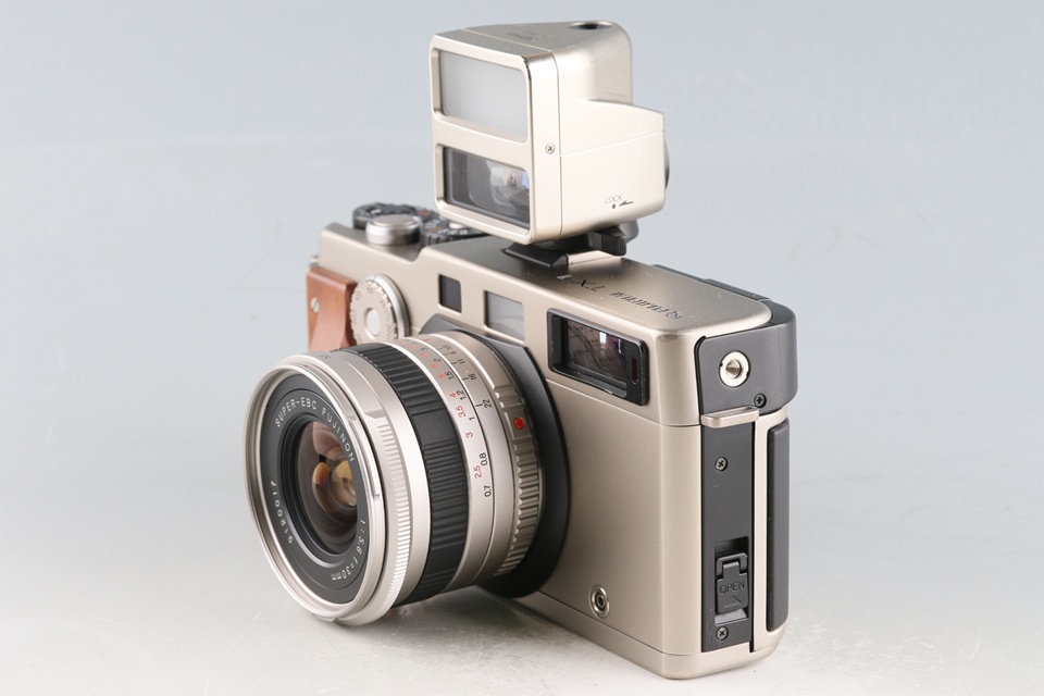 Fujifilm TX-1 + Super-EBC Fujinon 30mm F/5.6 Lens + Center Filter ND-3X + Lens Hood #58909D4
