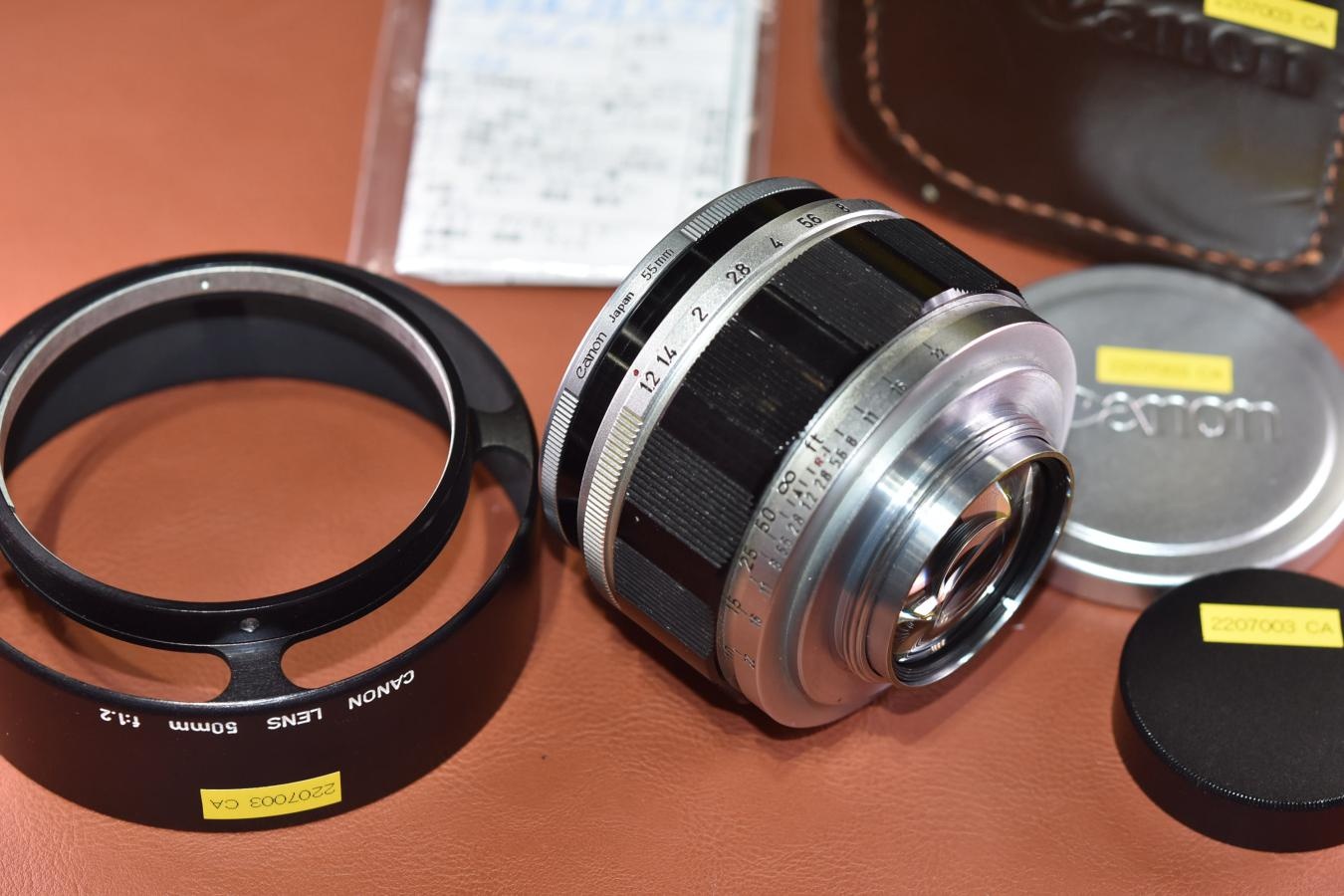 Canon 50mm F1.2 整備済 純正メタルフード、55mm銀枠フィルター付 【ライカLマウントレンズ】