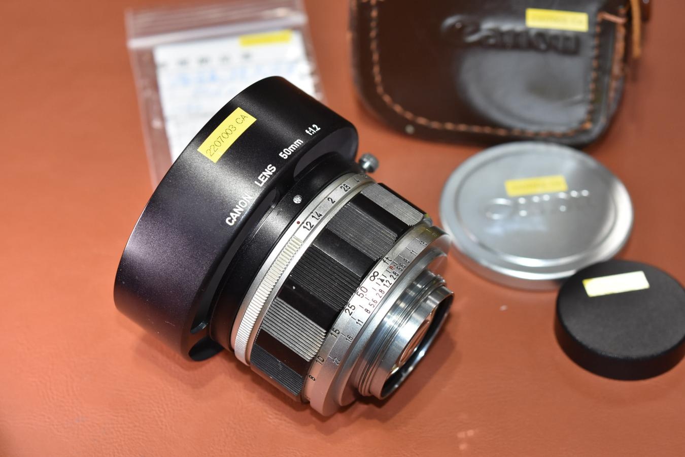 Canon 50mm F1.2 整備済 純正メタルフード、55mm銀枠フィルター付 【ライカLマウントレンズ】